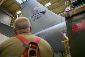 A KC-135 displays a new fin flash desgin with the wing colors of gold, blue, white and dark blue in the shape of Niagara Falls