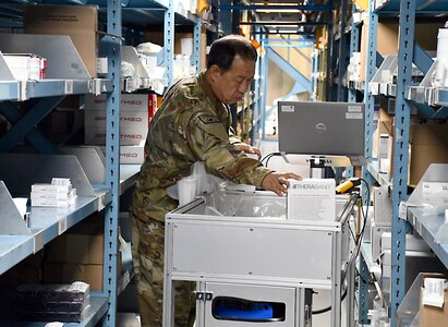 A member of the Korean Service Corps, a local national employee assigned to the U.S. Army Medical Materiel Center-Korea, completes inventory checks during Freedom Shield 2025 at Camp Carroll, Republic of Korea.