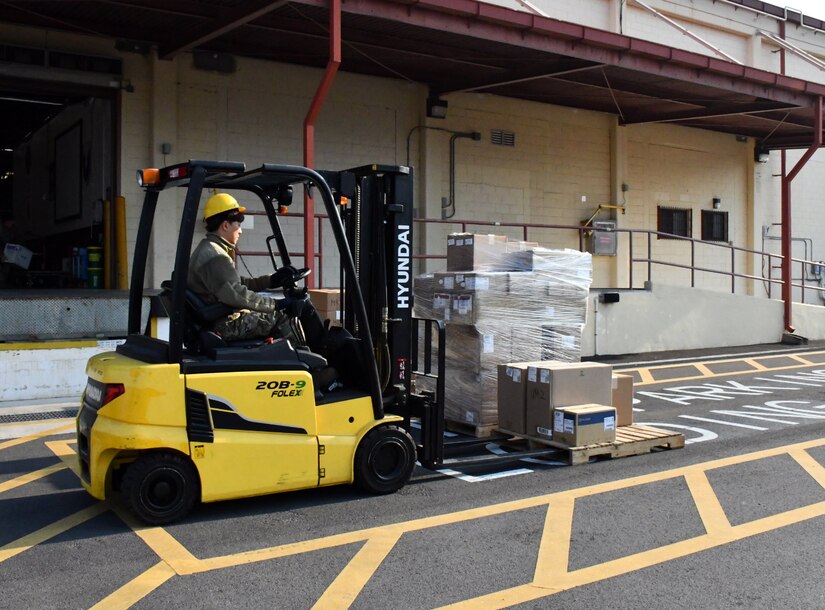 A worker at the U.S. Army Medical Materiel Center-Korea prepares to load a shipment of medical supplies at Camp Carroll, Republic of Korea, during Freedom Shield 2025. USAMMC-K demonstrated its capability as the theater lead agent for medical materiel, or TLAMM, during the joint 11-day exercise in March.