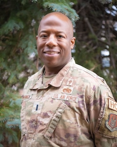 A man in uniform posing for a photo.