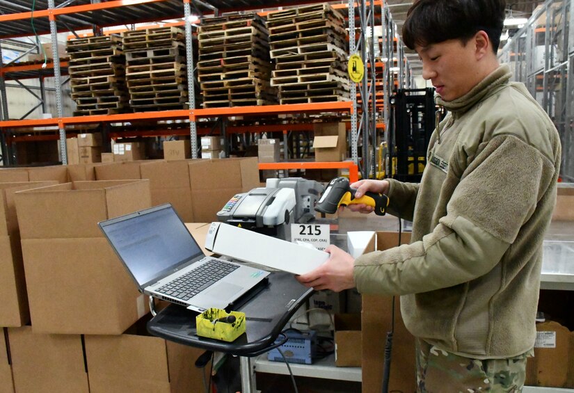A member of the Korean Service Corps, a local national employee assigned to the U.S. Army Medical Materiel Center-Korea, checks incoming medical materiel during Freedom Shield 2025 at Camp Carroll, Republic of Korea.