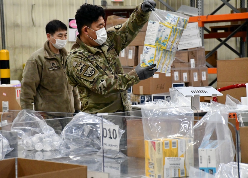 Members of the Korean Service Corps, local national employees working at the U.S. Army Medical Materiel Center-Korea, prepare a shipment of medical supplies during Freedom Shield 2025. USAMMC-K demonstrated its capability as the theater lead agent for medical materiel, or TLAMM, during the joint 11-day exercise in March.