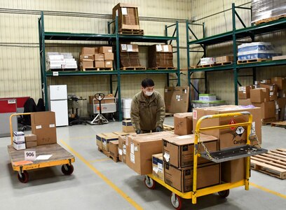 A member of the Korean Service Corps, a local national employee assigned to the U.S. Army Medical Materiel Center-Korea, checks incoming medical materiel during Freedom Shield 2025 at Camp Carroll, Republic of Korea.