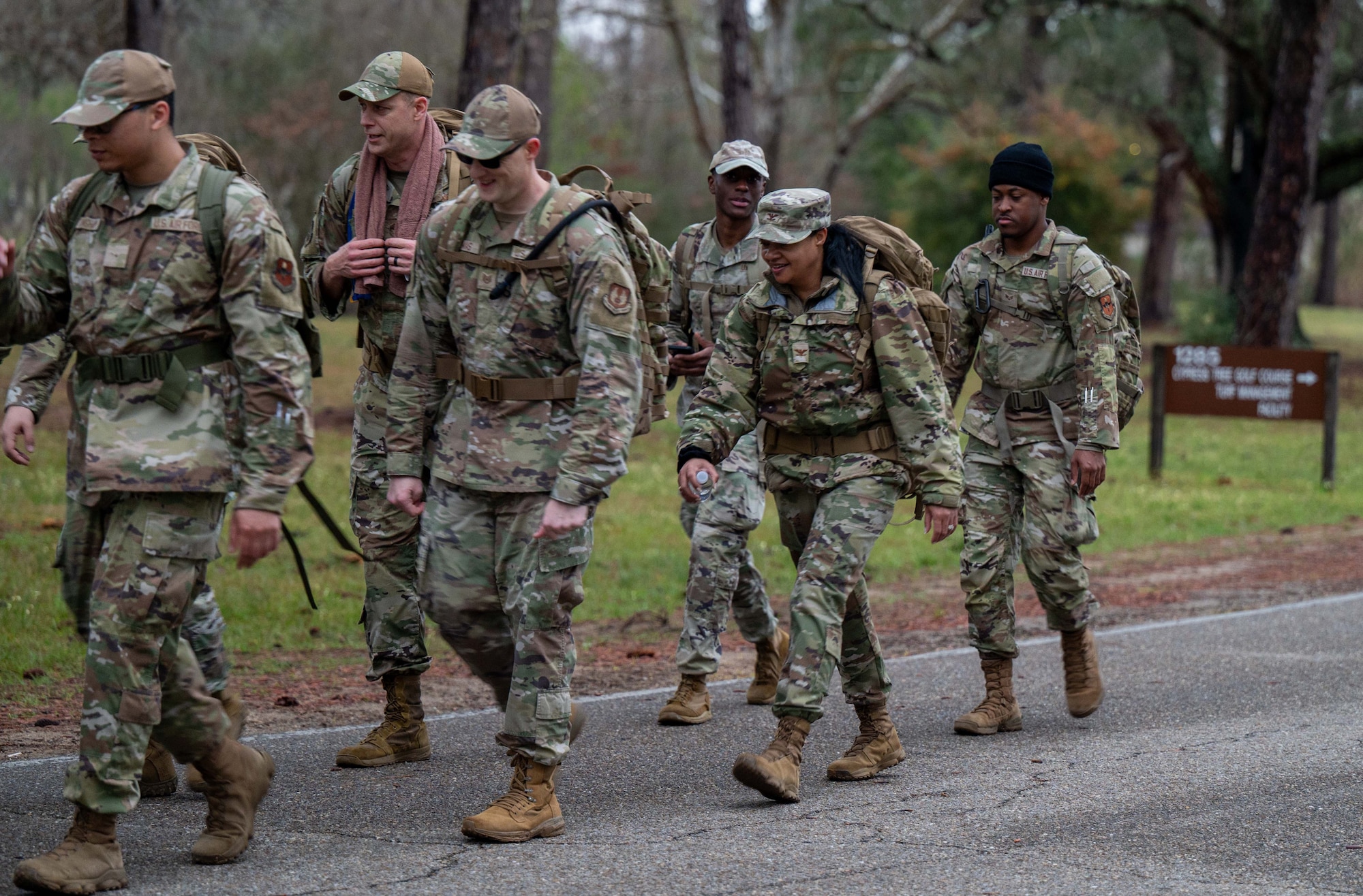 U.S. Air Force Col. Shamekia Toliver, 42nd Air Base Wing commander, and Chief Master Sgt. Caleb Vaden, 42nd ABW command chief, participate in the ruck march during the first day of the Crusader Challenge at Maxwell Air Force Base, Alabama, on March 10, 2025.