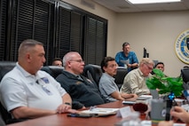 U.S. Airmen from the 628th Medical Group and Lowcountry first responders participate in a tabletop exercise at Joint Base Charleston, South Carolina, March 19, 2025. The tabletop exercise aimed to clarify the roles and responsibilities of all medical personnel involved, ensuring seamless cooperation during emergencies.