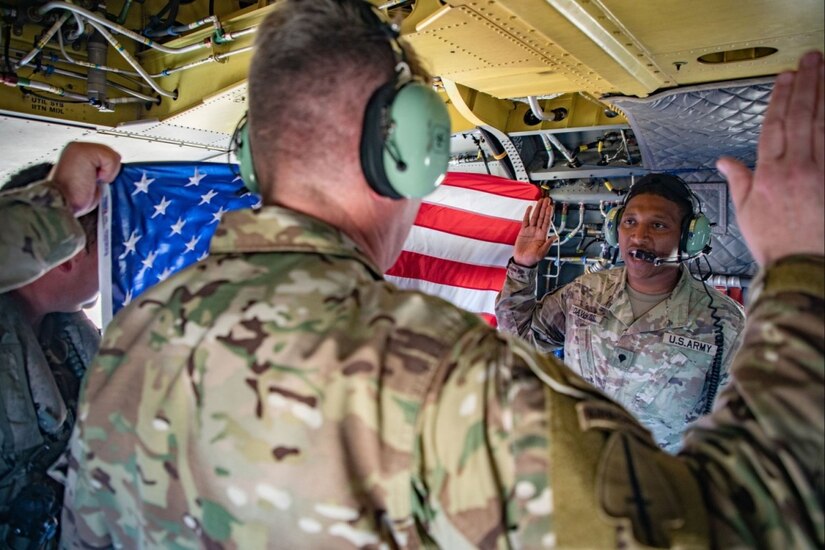 NAVAL STATION GUANTANAMO BAY, Cuba — Reenlistments symbolize more than just an extension of service. They represent a renewed commitment to duty, country and camaraderie.

Two U.S. Army South Soldiers, deployed as members of Joint Task Force Southern Guard, took that commitment to new heights by choosing to raise their right hands in a setting that reflects both the adventure and dedication that come with Army service.
