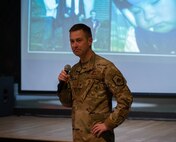 U.S. Air Force Col. George Chapman, 91st Missile Wing deputy commander, gives a speech at the 2025 Air Force Assistance Fund campaign kickoff event at Minot Air Force Base, North Dakota, March 19, 2025. The Air Force Assistance Fund provides aid to Airmen through it’s four charities: the General and Mrs. Curtis E. Lemay Foundation, Air Force Villages Charitable Foundation, Air Force Enlisted Village, and Air Force Aid Society. (U.S. Air Force photo by Airman 1st Class Wesley Davies)