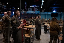 Team Minot Airmen gather at the 2025 Air Force Assistance Fund campaign kickoff event at Minot Air Force Base, North Dakota, March 19, 2025. The Air Force Assistance Fund campaign is an annual event that raises money for charities supporting Airmen and their families when in need. (U.S. Air Force photo by Airman 1st Class Wesley Davies)