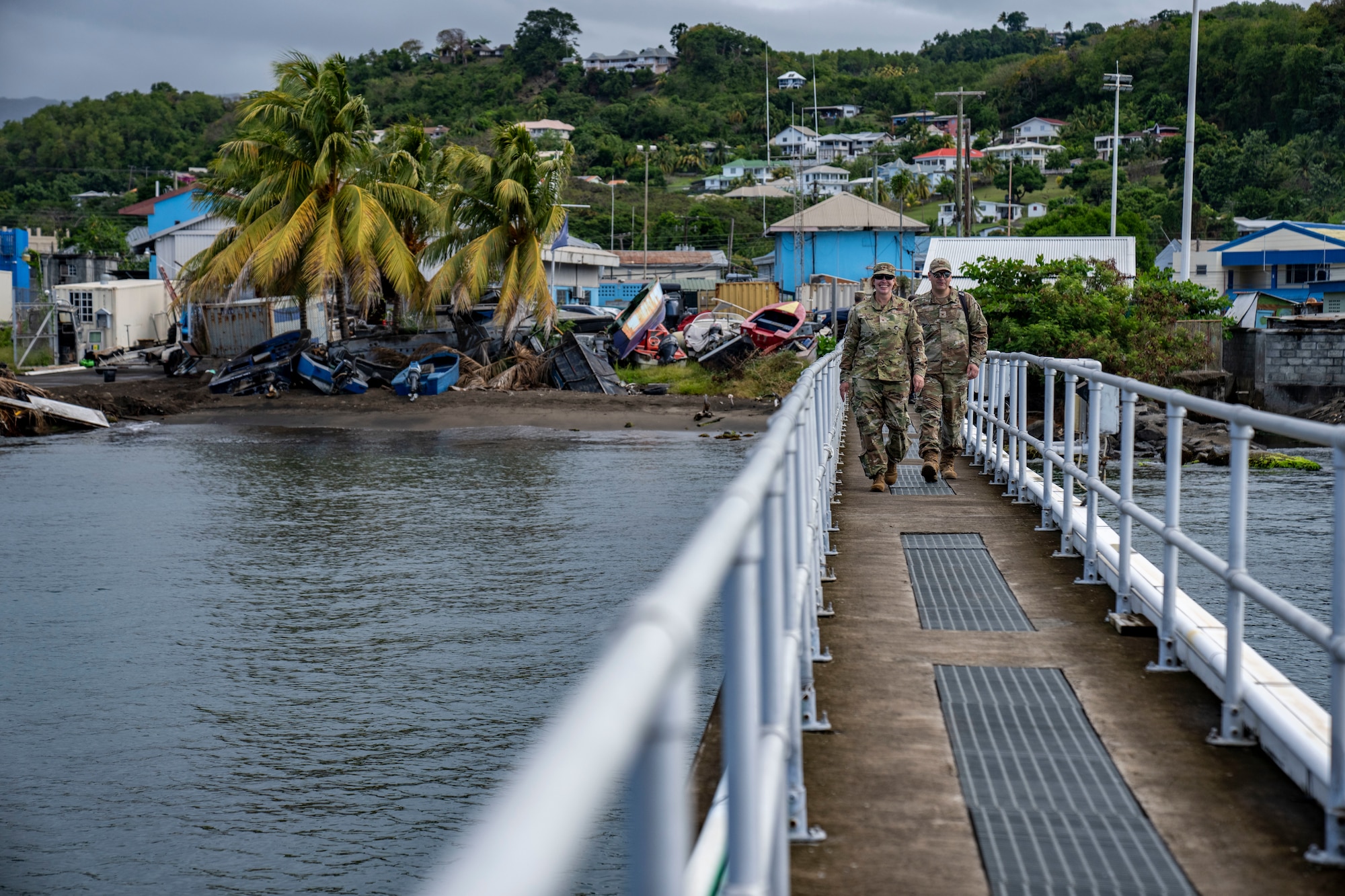 U.S. Air Force Brig. Gen. Tara Nolan, Mobilization Augmentee to the Air Forces Southern commander, walks with members of Lesser Antilles Medical Assistance Team (LAMAT) mission at Saint Vincent and the Grenadines, March 11, 2025. Nolan visited the LAMAT mission locations in Saint Lucia and Saint Vincent and the Grenadines to observe operations firsthand and engage with both Airmen and host nation officials.(U.S. Air Force photo by Andrea Jenkins)