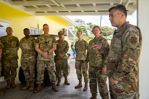 U.S. Air Force Col. Brian Gavitt, Air Forces Southern command surgeon, talks to Airmen during the Lesser Antilles Medical Assistance Team (LAMAT) 2025 mission at Canouan Island, Saint Vincent and the Grenadines, March 11, 2025. LAMAT 2025 is focused on strengthening medical readiness and global partnerships through healthcare engagements in the Lesser Antilles region and Guyana, embedding Air Force Reserve Command medical personnel with partner nation hospitals. (U.S Air Force photo by Andrea Jenkins)