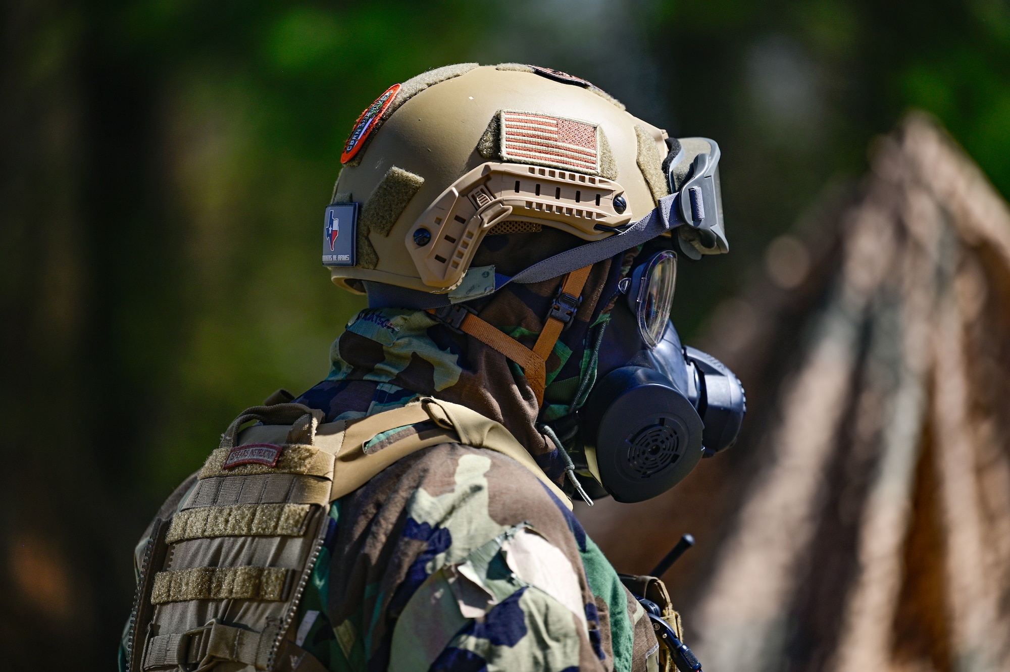An Airman assigned to the 19th Civil Engineer Squadron inspects the surrounding area during a Prime Base Engineer Emergency Force (Prime BEEF) field training exercise at Little Rock Air Force Base, Arkansas, March 19, 2025. The ability to rapidly set up a fully operational base is a key factor in maintaining air superiority and supporting mission objectives.