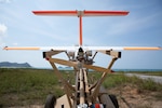 An Outlaw G2 MQM 170C target drone, an asset of U.S. Army Threat Systems Management Office and U.S. civilian contractors, Griffon Aerospace, is prepared a to launch for a simulated maritime strike at the Hat Yao Training Camp during exercise Cobra Gold, March 4. Cobra Gold is the largest joint exercise in mainland Asia taking place from Feb. 26 – Mar. 8, 2025. The maritime strike simulation showcases the strength and coordination of joint forces and demonstrates advanced missile capabilities. Cobra Gold highlights the strong partnership between Thailand and the United States while strengthening interoperability and enhancing readiness through field exercises, disaster simulations and humanitarian projects with allied and partnered nations and civilian agencies. (U.S. Navy photo by Mass Communication Specialist 1st Class Victoria Granado)
