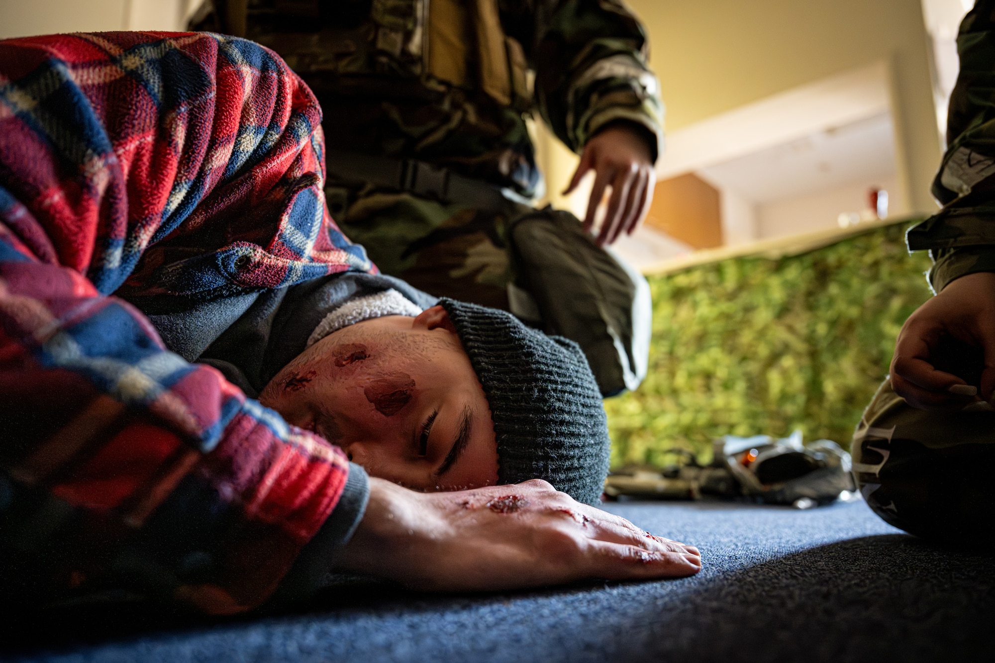 Airman lies on the floor