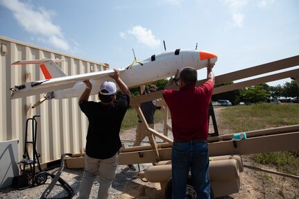 U.S. government contractors with the U.S. Army's Threat Systems Management Office and U.S. civilian contractors with Griffon Aerospace, prepare an Outlaw G2 MQM 170C target drone to launch for a simulated maritime strike at the Hat Yao Training Camp during exercise Cobra Gold, March 4.