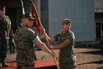 U.S. Marine Corps Capt. Louis Collins, left, a company commander with 1st Battalion, 5th Marine Regiment, attached to Marine Rotational Force-Southeast Asia, I Marine Expeditionary Force, and Singapore Guardsman Lt. Col. Mohamad Fahrul Bin Saaid, the commanding officer for 3rd Battalion Singapore Guards, pose for a photo during the opening ceremony for Valiant Mark 25 on Bedok Camp, Singapore, March 17, 2025.