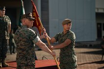 U.S. Marine Corps Capt. Louis Collins, left, a company commander with 1st Battalion, 5th Marine Regiment, attached to Marine Rotational Force-Southeast Asia, I Marine Expeditionary Force, and Singapore Guardsman Lt. Col. Mohamad Fahrul Bin Saaid, the commanding officer for 3rd Battalion Singapore Guards, pose for a photo during the opening ceremony for Valiant Mark 25 on Bedok Camp, Singapore, March 17, 2025.