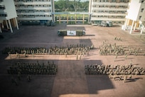 U.S. Marines attached to Marine Rotational Force-Southeast Asia, I Marine Expeditionary Force, alongside Singapore Guardsmen with 7th Singapore Infantry Brigade, stand-by for the opening ceremony for Valiant Mark 25 on Bedok Camp, Singapore, March 17, 2025.