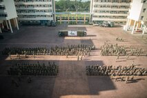 U.S. Marines attached to Marine Rotational Force-Southeast Asia, I Marine Expeditionary Force, alongside Singapore Guardsmen with 7th Singapore Infantry Brigade, stand-by for the opening ceremony for Valiant Mark 25 on Bedok Camp, Singapore, March 17, 2025.