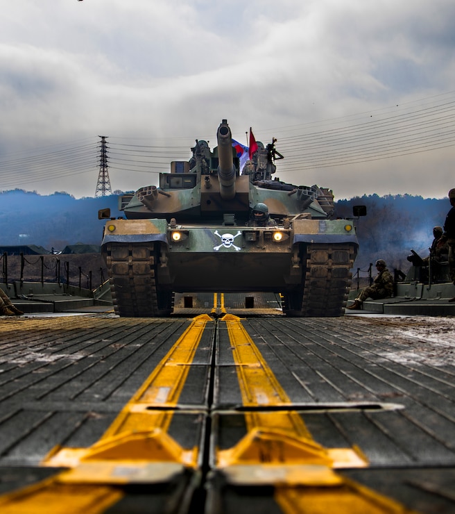 A Republic of Korea, 1st Capital Mechanized Infantry Brigade, K1 tank crosses a U.S. Army Improved Ribbon Bridge (IRB) during joint wet gap training as part of Freedom Shield 25 at Yeoncheon-gun, Republic of Korea, on March 20, 2025.