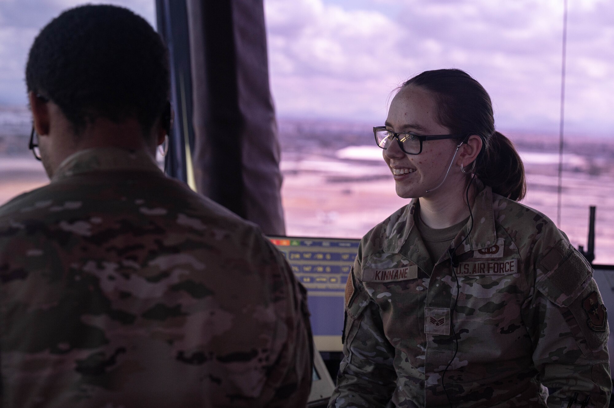 Senior Airman Kristen Kinnane, 56th Operations Support Squadron air traffic control apprentice, converses with her wingman, Mar. 12, 2025, at Luke Air Force Base, Arizona.