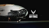 An aircraft sits on a flight line.