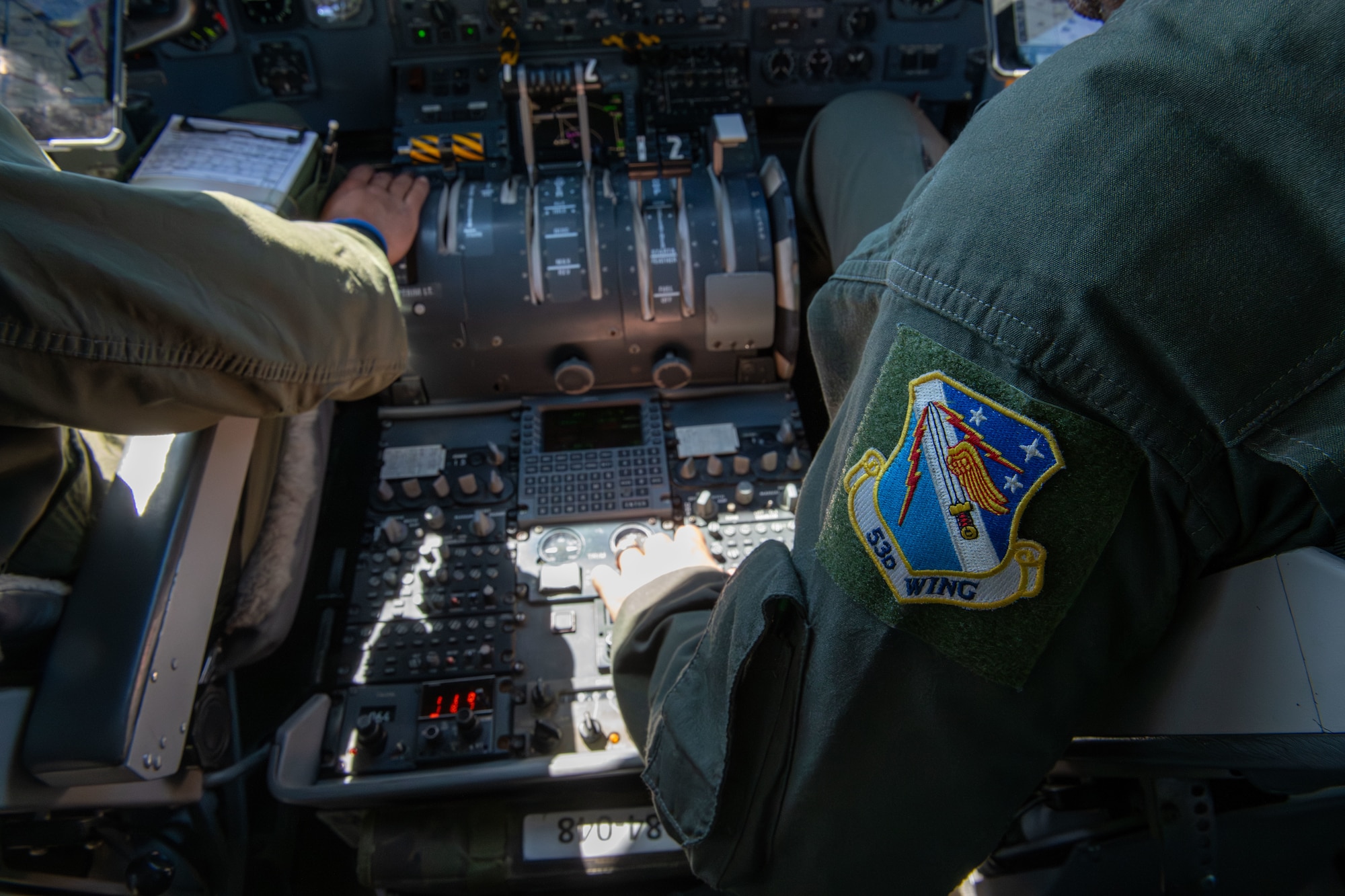 A pilot operating a plane.