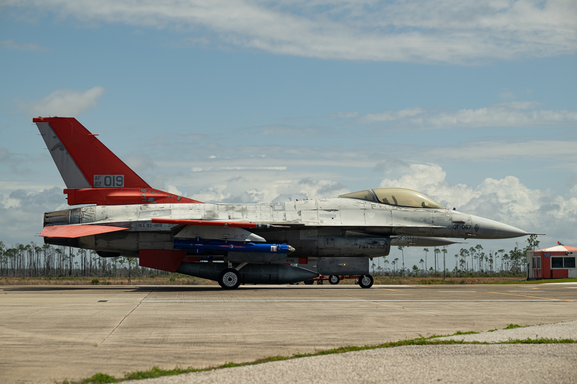 An aircraft prepares to take off from the flight line