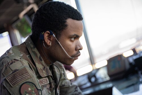 Airman 1st Class Kadarien Johnson, 56th Operations Support Squadron air traffic control apprentice, marks down the times of landings, Mar. 4, 2025, at Luke Air Force Base, Arizona.