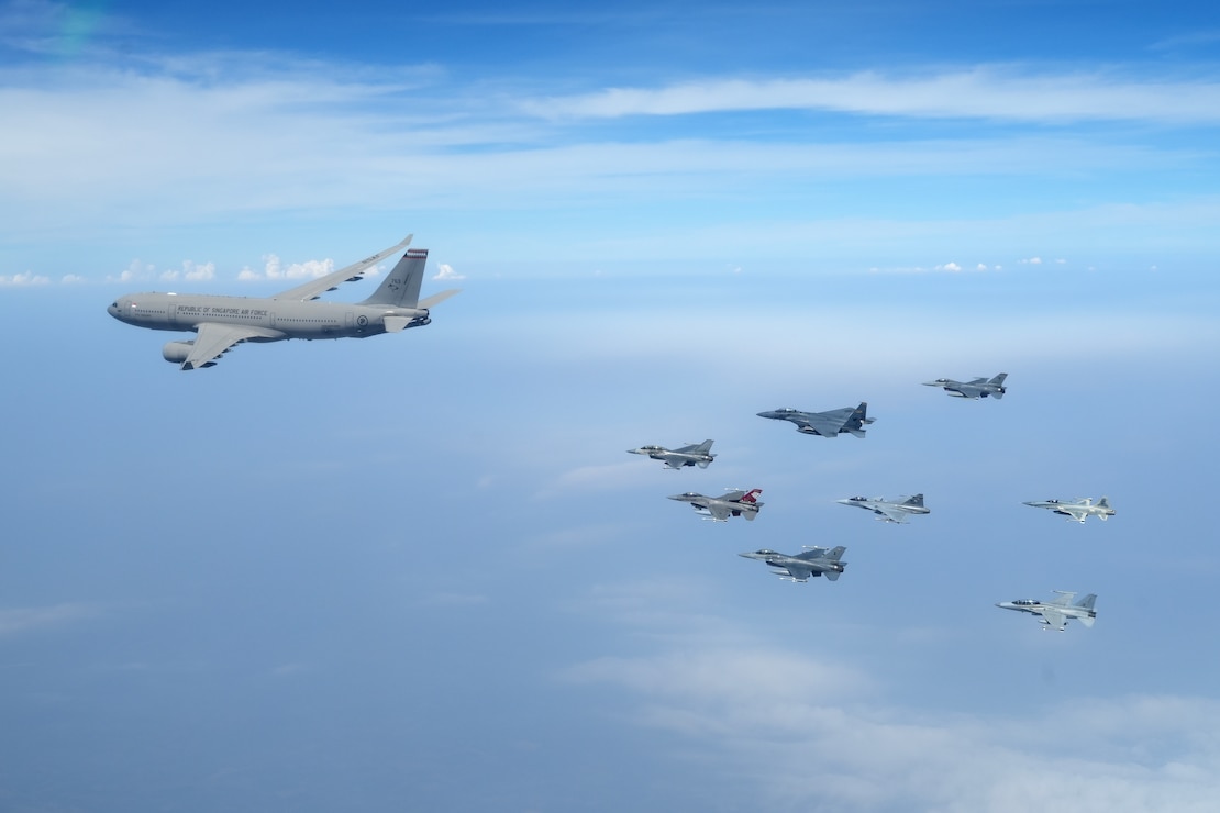 Aircraft from the U.S. Air Force, the Royal Thai Air Force and the Republic of Singapore Air Force fly in formation during Cope Tiger 25 in Thailand, Mar. 18, 2025. The flight formation served as a symbol of airpower, cooperation and friendship among the three nations. (Courtesy Photo)