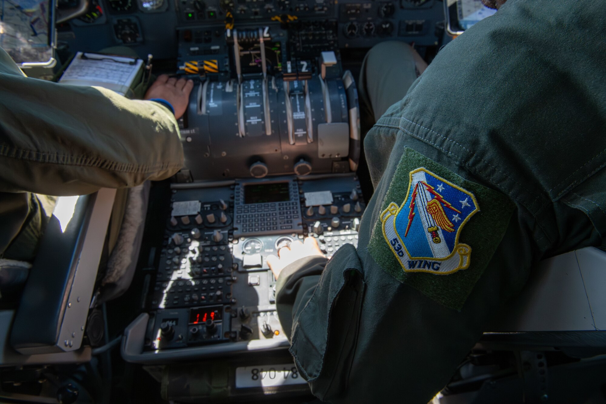 A pilot operating a plane.