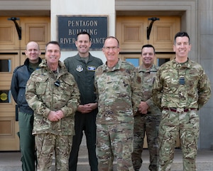 Military leaders stand as a group