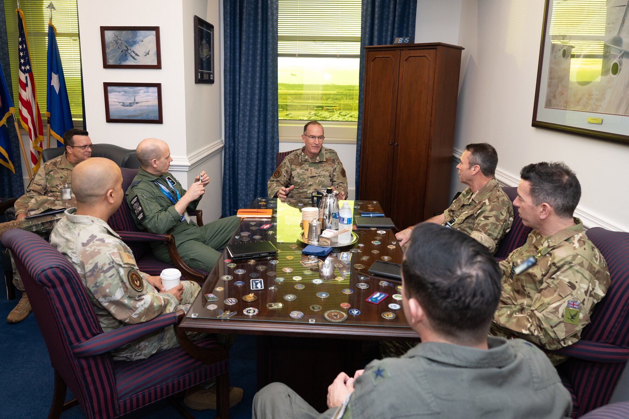 Lt. Gen. John Healy sits with leaders