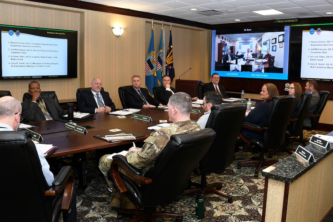 People in a conference room having virtual meeting