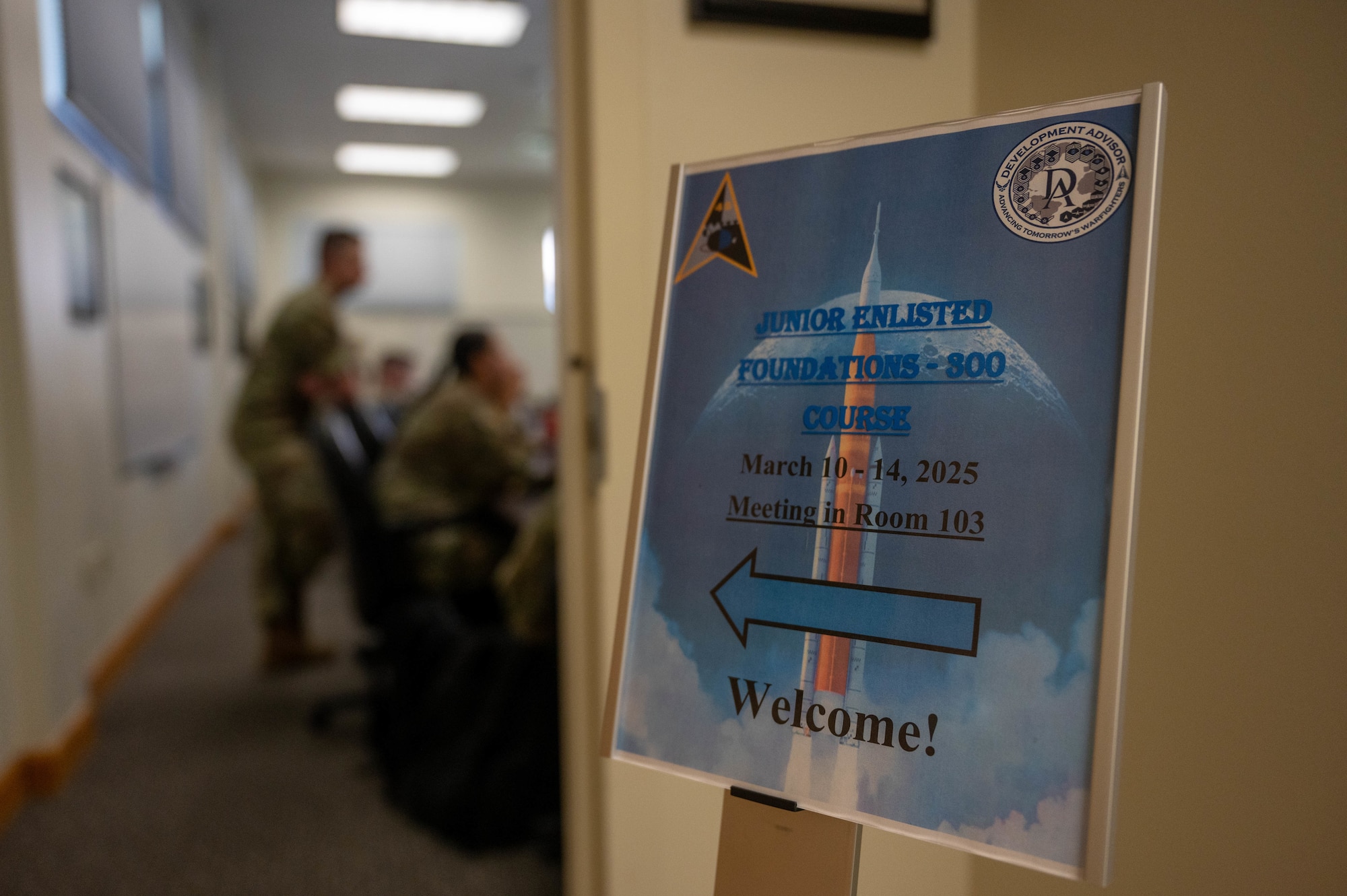 A welcome sign for the Junior Enlisted Foundations 300 course directs students into classroom March 13, 2025, at Patrick Space Force Base, Florida. JEFC300 equips Airmen with core leadership principles, critical professional competencies, and a deeper understanding of Air Force values—reinforcing their ability to lead effectively, elevate unit performance, and contribute to operational excellence across the force. (U.S. Space Force photo by Senior Airman Samuel Becker)