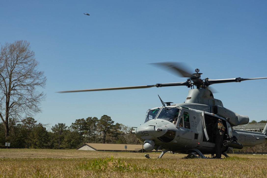 A U.S. Marine Corps UH-1Y Venom utility helicopter with Marine Light Attack Helicopter Squadron (HMLA) 773, 4th Marine Aircraft Wing, Marine Forces Reserve, prepares to transport Marines during a field exercise on Camp Shelby Joint Forces Training Center, Mississippi, March 12, 2025. MARFORRES Marines conducted the exercise to maintain proficiency in warfighting, communication and leadership skills common to all Marines. (U.S. Marine Corps photo by Lance Cpl. Van Hoang)