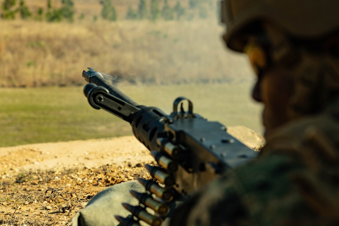 U.S. Marine Corps Lance Cpl. Shane Lopez, a financial management resource analyst with Marine Forces Reserve, fires an M2 machine gun during a field exercise on Camp Shelby Joint Forces Training Center, Mississippi, March 11, 2025. MARFORRES Marines conducted the exercise to maintain proficiency in warfighting, communication and leadership skills common to all Marines. (U.S. Marine Corps photo by Lance Cpl. Van Hoang)