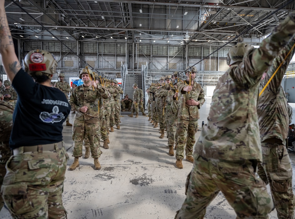 The team was scheduled to conduct parachute jumps during the day until weather conditions prevented clearance to jump. (U.S. Air Force photo by Jack Gardner)