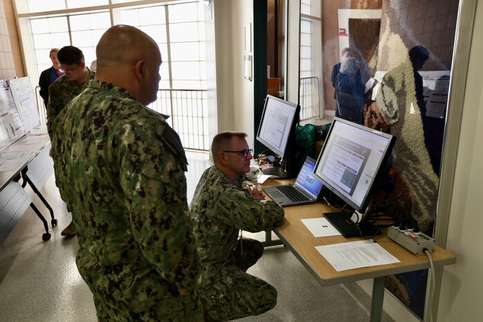 Sailors and staff at Navy Medicine Readiness and Training Command (NMRTC) Twentynine Palms showcase innovative projects aimed at enhancing patient care, streamlining operations, and improving efficiency during the 10th Annual Process Improvement Fair on March 14, 2025. The event highlighted 15 projects across multiple departments, with top honors awarded to initiatives focused on warehouse optimization, medical readiness assessments, and supply management. (U.S. Navy photo by Christopher C. Jones, NHTP/NMRTC Twentynine Palms public affairs officer).