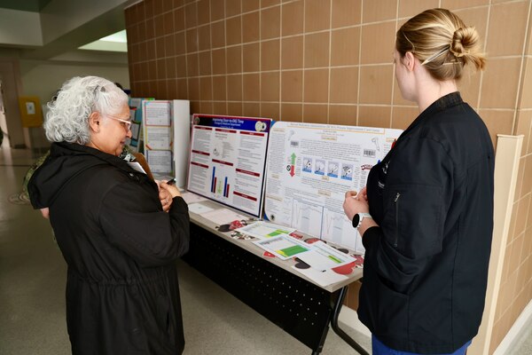 Sailors and staff at Navy Medicine Readiness and Training Command (NMRTC) Twentynine Palms showcase innovative projects aimed at enhancing patient care, streamlining operations, and improving efficiency during the 10th Annual Process Improvement Fair on March 14, 2025. The event highlighted 15 projects across multiple departments, with top honors awarded to initiatives focused on warehouse optimization, medical readiness assessments, and supply management (U.S. Navy photo by Christopher C. Jones, NHTP/NMRTC Twentynine Palms public affairs officer).