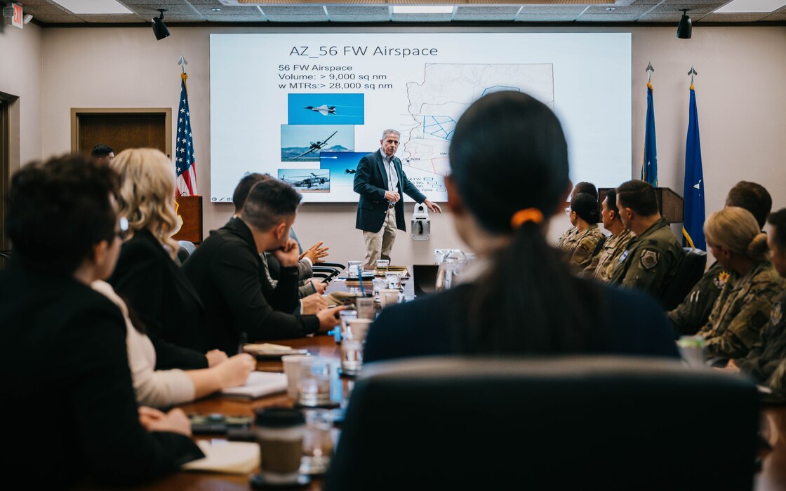 Charles Buchanan, 56th Fighter Wing range management officer, briefs Dr. Jooeun Kim (middle), Arizona Senator Mark Kelly’s National Security Advisor, and counterparts.