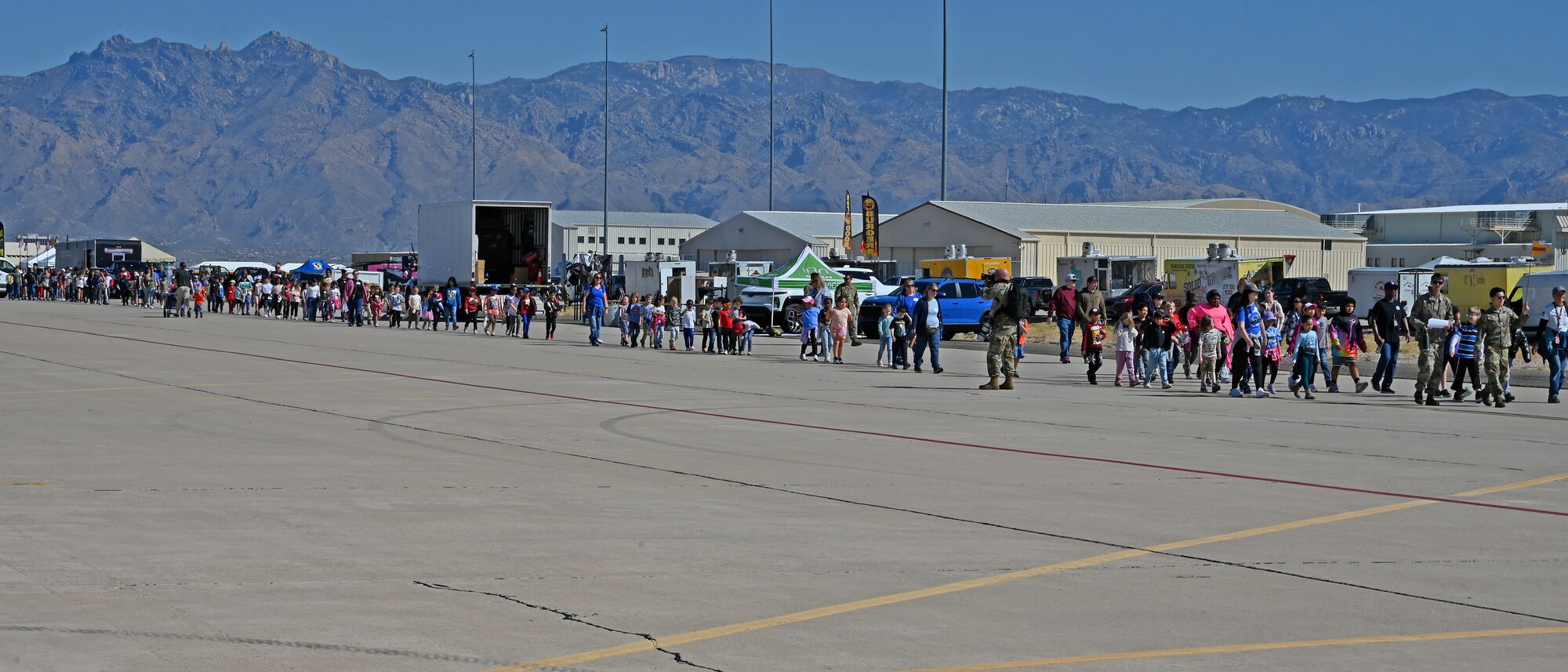 Students from the Tucson community explore the Thunder and Lightning Over Arizona Air Show at Davis-Monthan Air Force Base, Arizona, March 21, 2025. The base opened its gates to 1,100 students to interact with science, technology, engineering, art and math activities. (U.S. Air Force photo by Staff Sgt. Abbey Rieves)