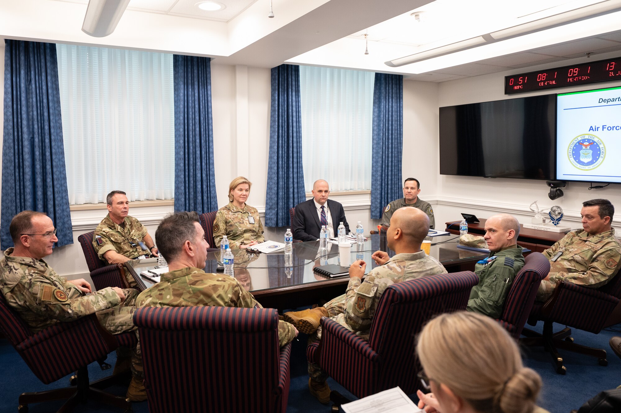 Lt. Gen. John Healy sits with leaders
