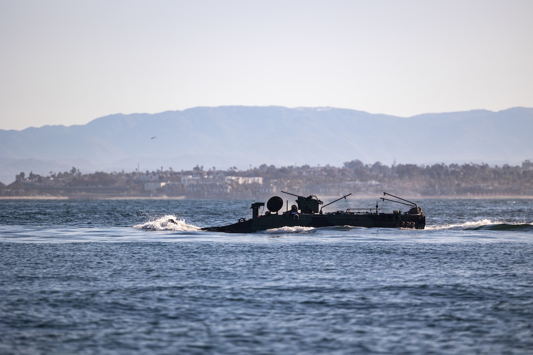 U.S. Marine Corps amphibious combat vehicles with 3rd Assault Amphibian Battalion, 1st Marine Division, I Marine Expeditionary Force, maneuver in the open ocean during Quarterly Underway Amphibious Readiness Training 25.2 while underway in the Pacific Ocean, March 9, 2025.