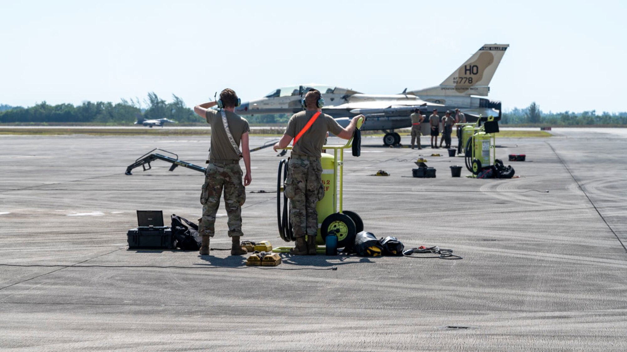U.S. Air Force Airmen assigned to the 49th Maintenance Group perform pre-flight checks on a U.S. Air Force F-16 Fighting Falcon Homestead Air Reserve Base, Florida, March 10, 2025. The Large Force Exercise provided invaluable exposure to new environments and equipment, enabling Airmen to adapt quickly and efficiently, enhancing their ability to deploy, operate, and troubleshoot in dynamic and ever-changing conditions. (U.S. Air Force photo by Senior Airman Michelle Ferrari)