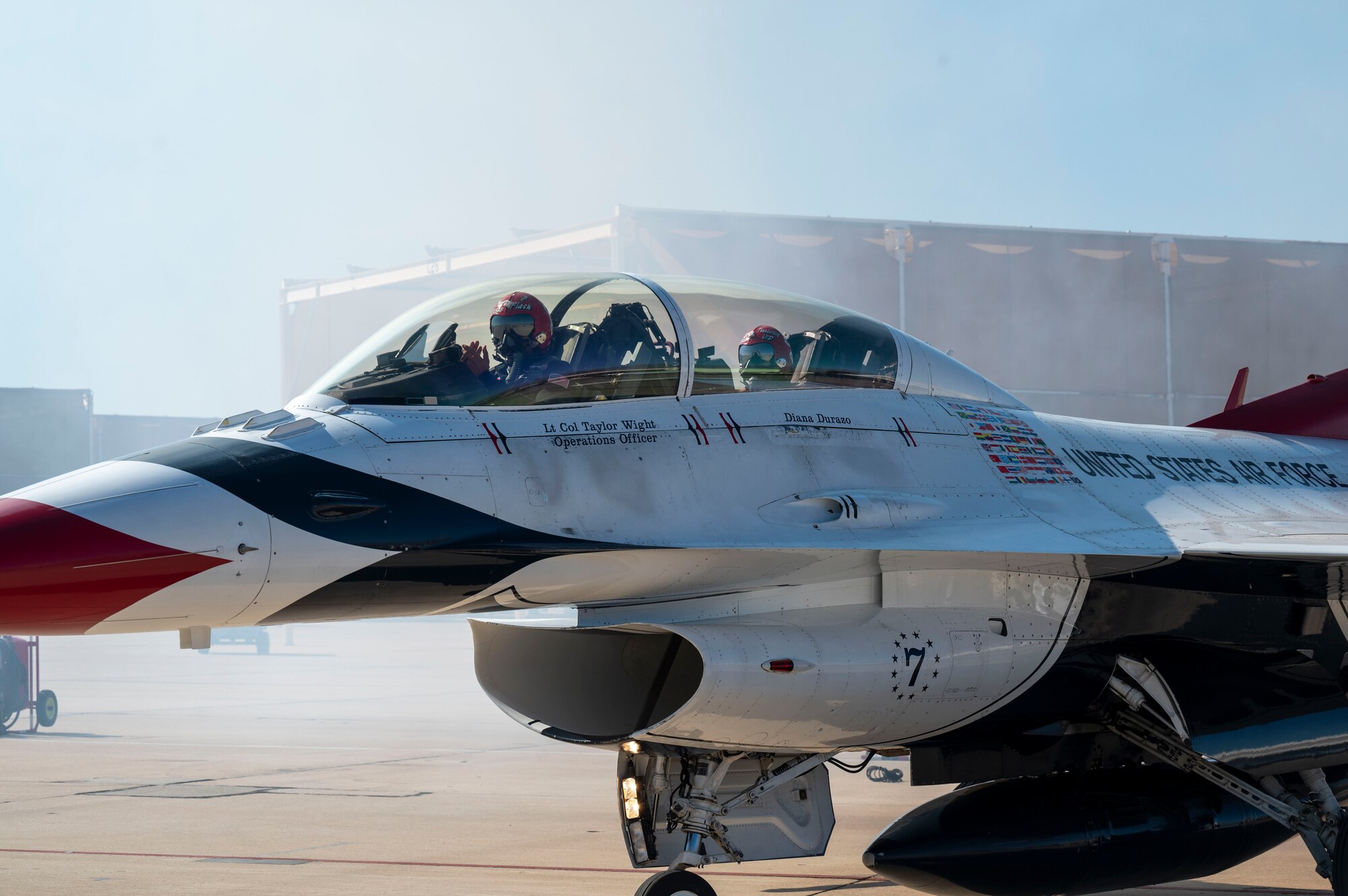 U.S. Air Force Lt. Col. Taylor Wight, United States Air Force Air Demonstration Squadron "Thunderbirds” Thunderbird 7, and Diana Durazo, Pima County Administrator’s Office senior advisor and Tucson Hometown Hero, return from the Hometown Hero incentive flight at Davis-Monthan Air Force Base, Arizona, March 21, 2025. The Thunderbirds Hometown Hero program recognizes individuals who make a profound and positive impact on their community by giving them a ride in the back of a Thunderbird F-16 Fighting Falcon. (U.S. Air Force photo by Airman Samantha Melecio)