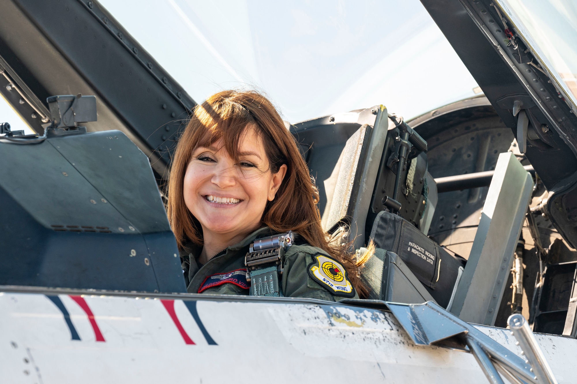 Diana Durazo, Pima County Administrator’s Office senior advisor and Tucson Hometown Hero, sits in the cockpit of a Thunderbirds aerial demonstration team F-16 Fighting Falcon before an incentive flight at Davis-Monthan Air Force Base, Arizona, March 21, 2025. Durazo’s Hometown Hero incentive flight took place during the 2025 Thunder and Lightning over Arizona Air Show. (U.S. Air Force photo by Airman Samantha Melecio)