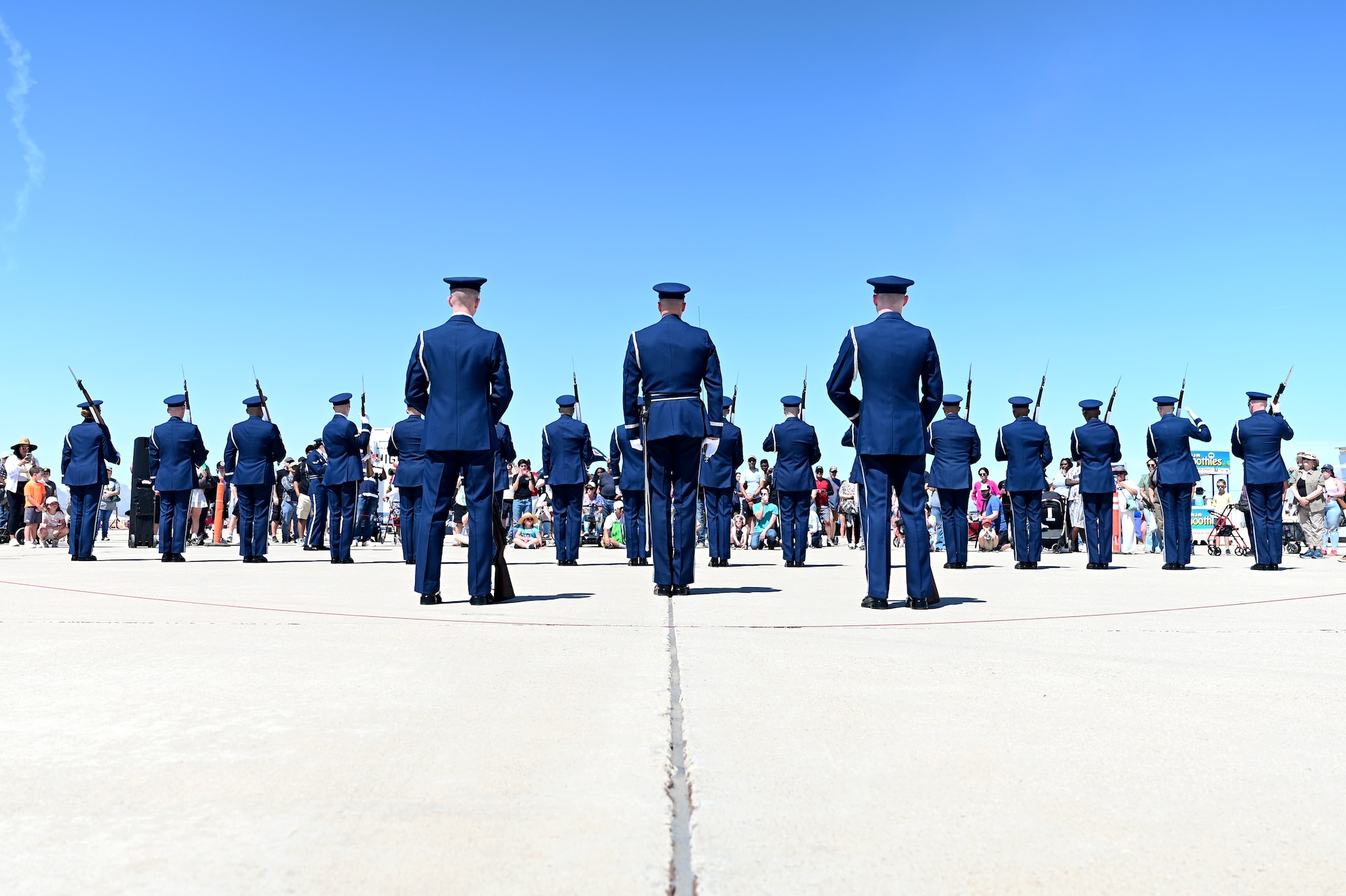 Members of the U.S. Air Force Honor Guard Drill Team prepare to perform at Davis-Monthan Air Force Base, Arizona, March 22, 2025. A standard USAF Drill Team performance features a professionally choreographed sequence. (U.S. Air Force photo by Senior Airman Andrew Garavito)