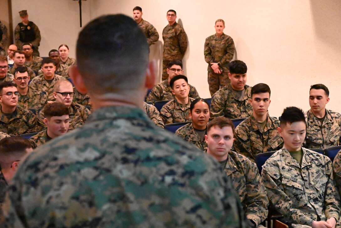 U.S. Marine Corps Sgt. Maj. Carlos A. Ruiz, the sergeant major of the Marine Corps, visited Marines, sailors, and staff at Combined Arms Training Center, Camp Fuji, Japan, March 21, 2025. It is his fourth visit to the INDOPACOM as the SMMC. Ruiz listens to a Marine's feedback during his visit. (U.S. Marine Corps photo by Song Jordan)