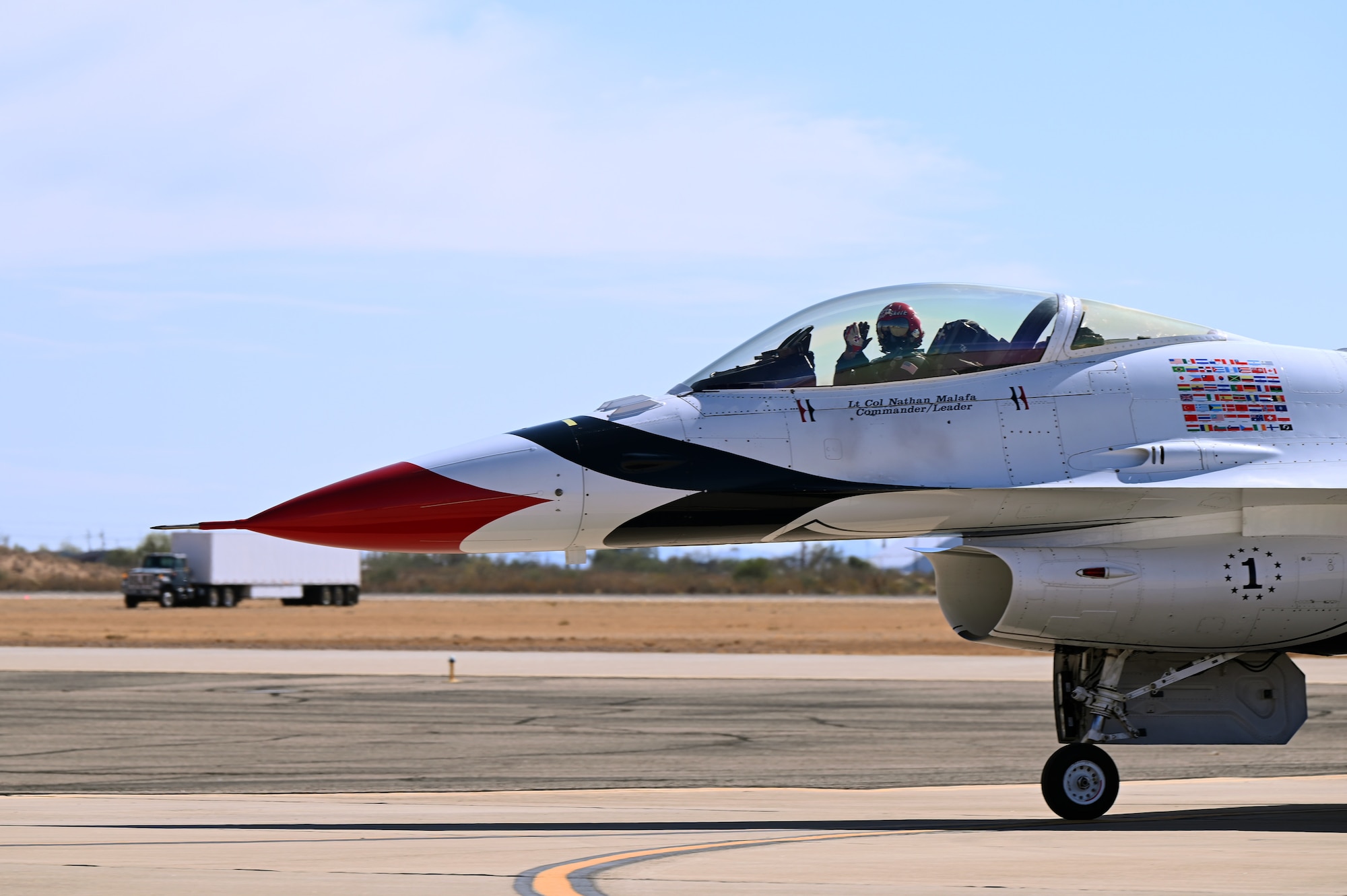 The United States Air Force Air Demonstration Squadron "Thunderbirds” Lt. Col. Nathan Malafa, commander and pilot, taxis before flight during the Thunder and Lightning Over Arizona Air Show at Davis-Monthan Air Force Base, Arizona, March 23, 2025. The air show was open to the public as a way to connect the base and local community while also highlighting the mission and capabilities of the USAF.  (U.S. Air Force photo by Senior Airman Andrew Garavito)