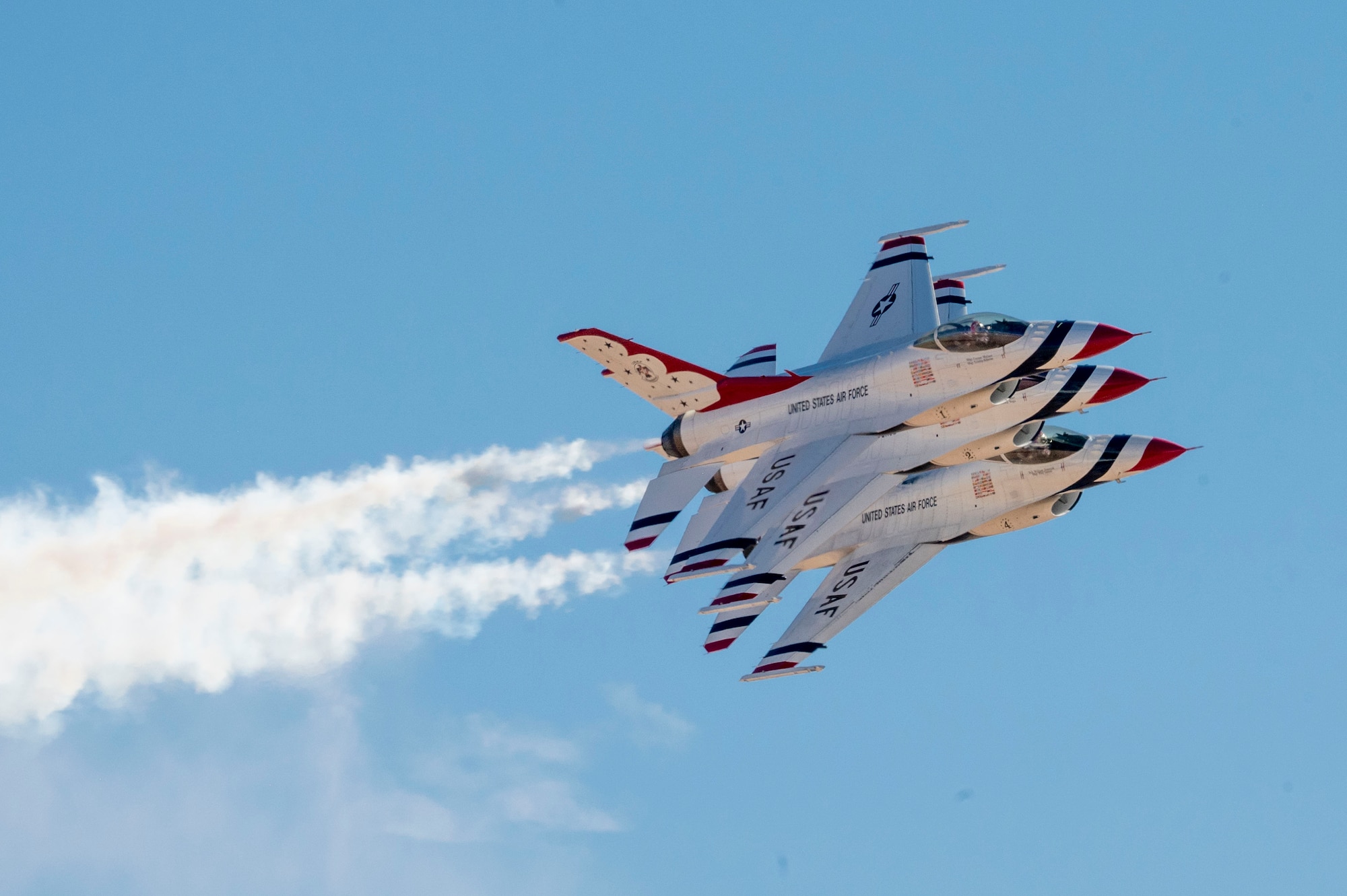 The U.S. Air Force Air Demonstration Squadron “Thunderbirds” fly in formation during the 2025 Thunder and Lightning Over Arizona Air Show at Davis-Monthan Air Force Base, Arizona, March 23, 2025. The formation exhibited the precision and skill to fly in close formation. (U.S. Air Force photo by Airman Samantha Melecio)